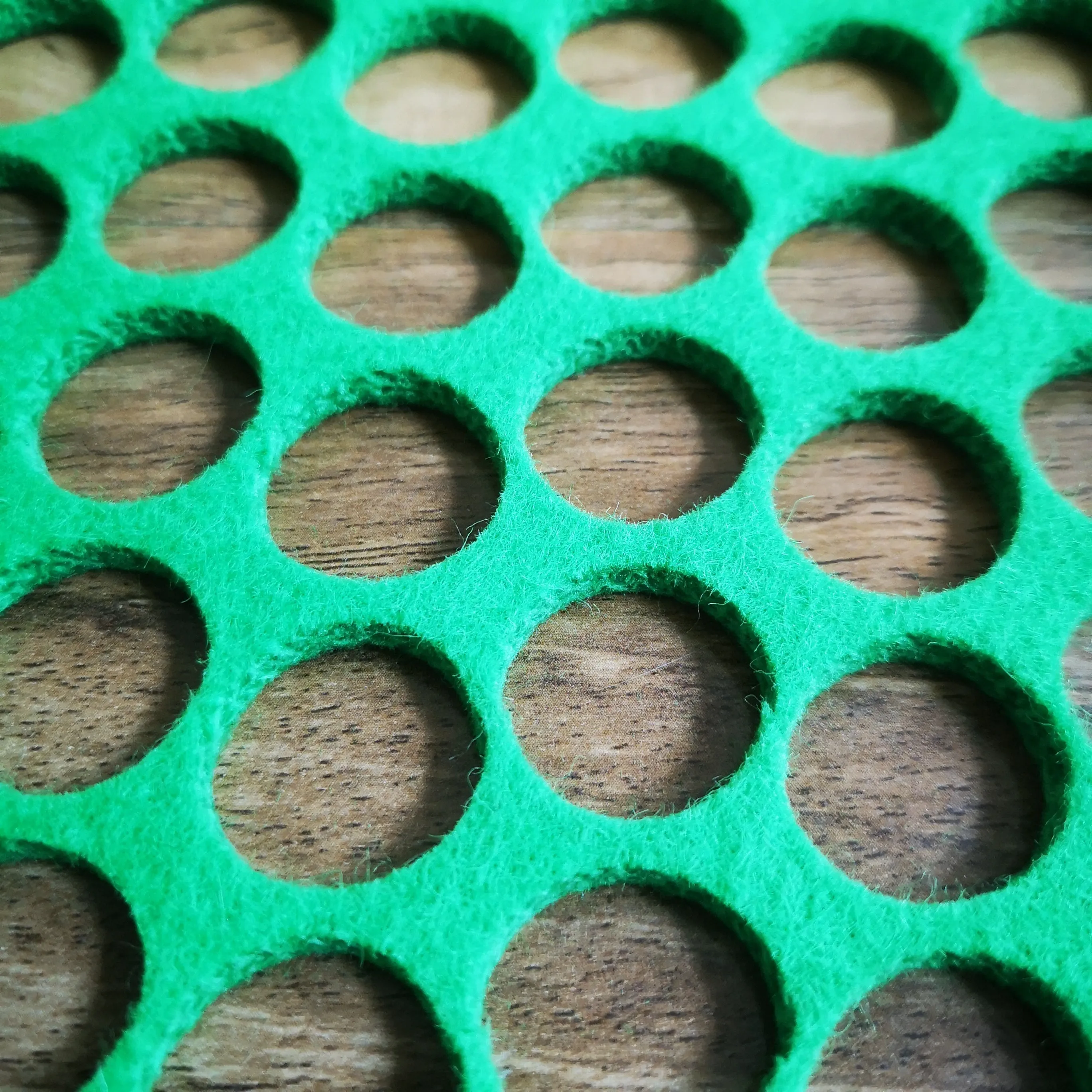 Felt blanket with circle cut outs - large holes